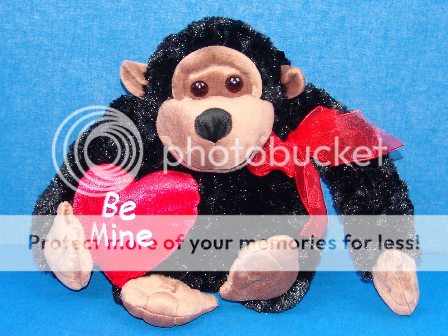 stuffed monkey with heart